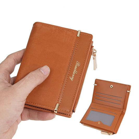Compact women’s wallet with zipper coin pocket, multiple card slots, and cash compartment in a stylish design.

